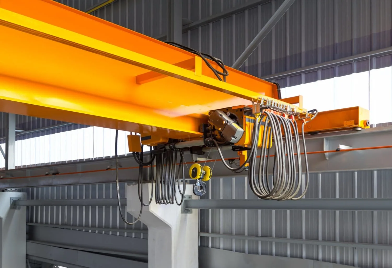 Overhead crane operating in an industrial facility